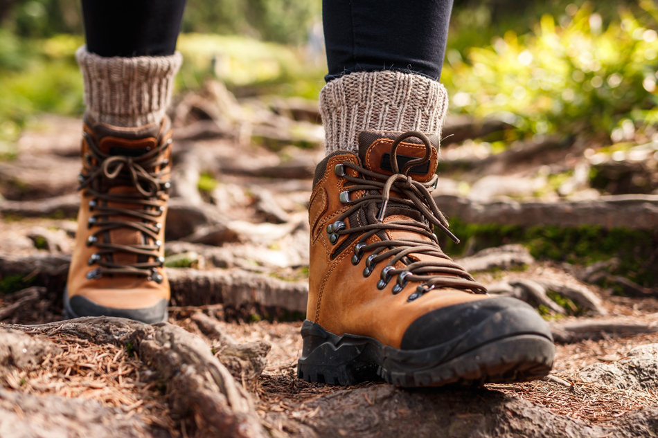 Close up of woman's hiking boots in the wilderness.